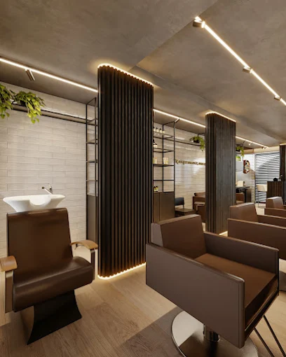 Interior da BM Barbearia — cadeiras premium e lavatório